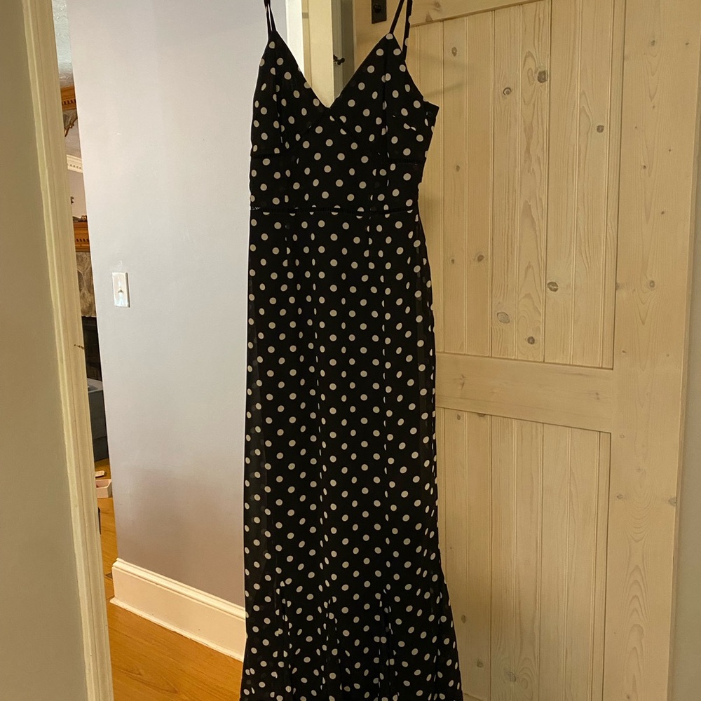 Best Spot to Be Black Polka Dot Sleeveless Ruffled Midi Dress
